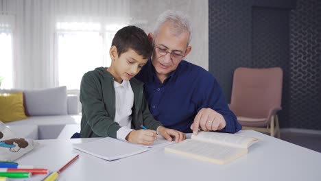 Father-helping-his-son-with-homework.